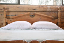 One of three comfy queen beds at Ridgerunner Cabin, Taos Ski Valley
